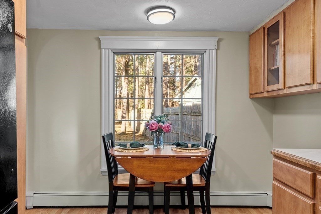 67 Pine Street Sudbury, MA 01776 - Photo 21 of 41 a dining room with furniture and window