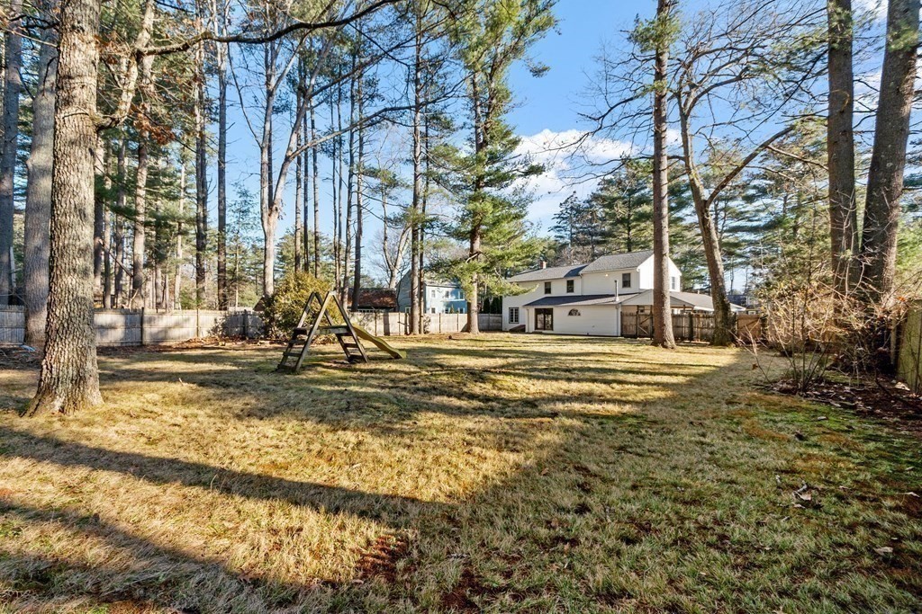 67 Pine Street Sudbury, MA 01776 - Photo 32 of 41 a view of street with large trees
