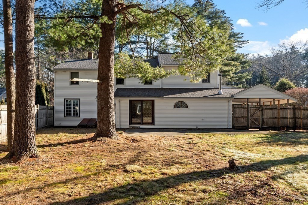 67 Pine Street Sudbury, MA 01776 - Photo 5 of 41 a view of a house with a tree in front of it