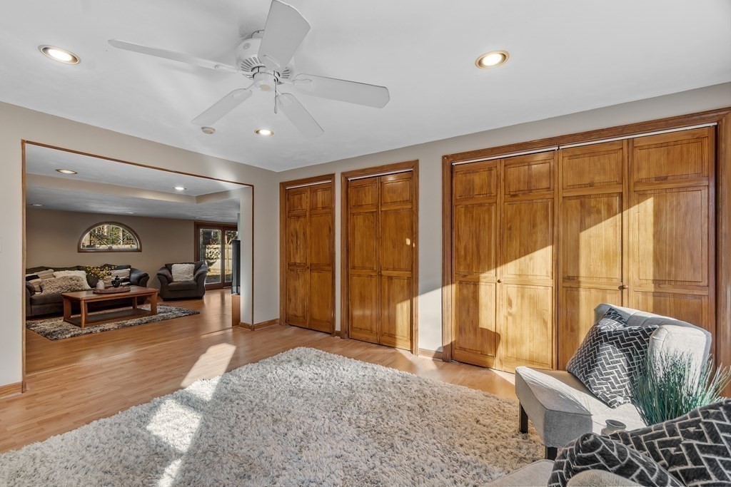 67 Pine Street Sudbury, MA 01776 - Photo 9 of 41 a living room with furniture and large windows
