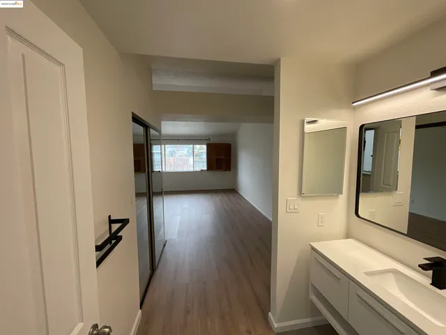 a view of a bathroom from the hallway