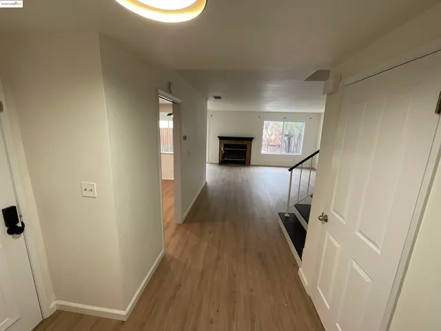 a view of a livingroom with wooden floor