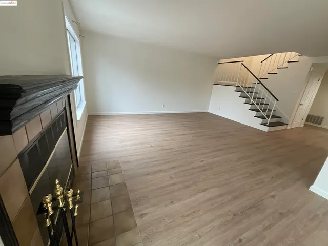 wooden floor with staircase