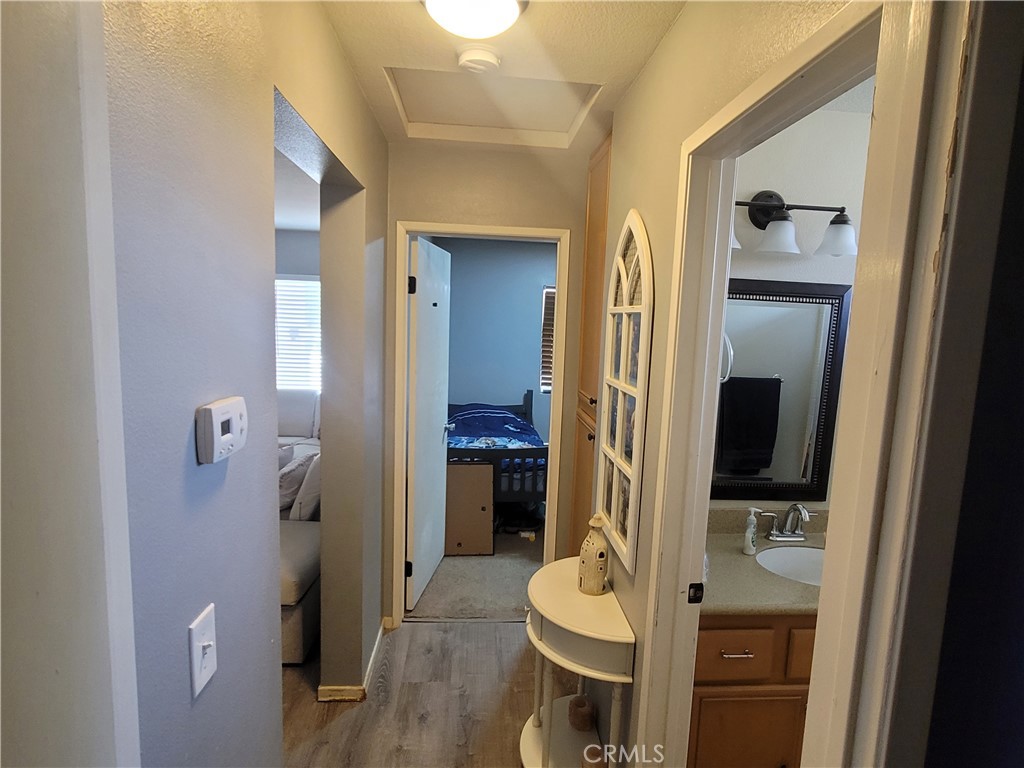 11930 Poppy Road Adelanto, CA 92301 - Photo 18 of 22 a bathroom with a tub and shower