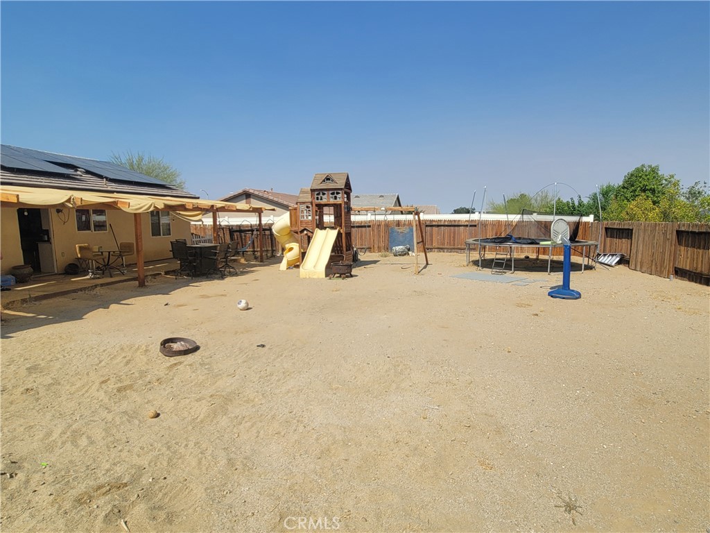 11930 Poppy Road Adelanto, CA 92301 - Photo 22 of 22 a view of a parking space