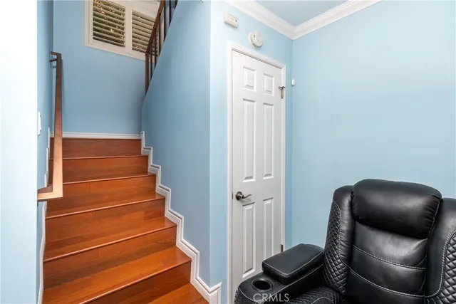 a view of entryway with wooden floor