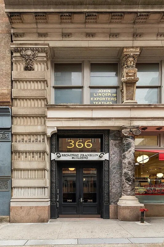 366 Broadway, Unit PH12B Manhattan, NY 10013 - Photo 21 of 23 a black and white building with a sign on it