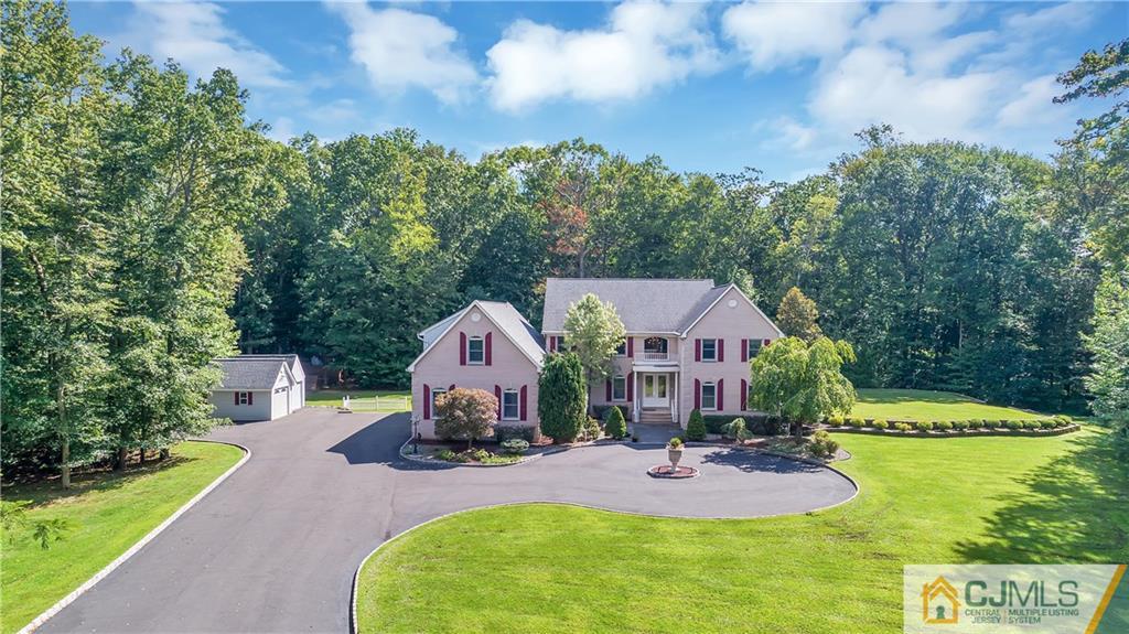 92 Union Valley Road Monroe Township, NJ 08831 - Photo 1 of 23 an aerial view of a house with swimming pool garden and patio