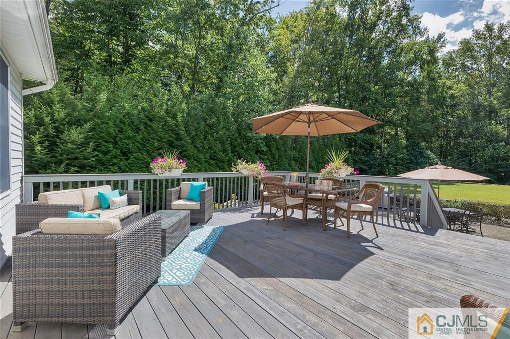 92 Union Valley Road Monroe Township, NJ 08831 - Photo 22 of 23 a view of a deck with furniture