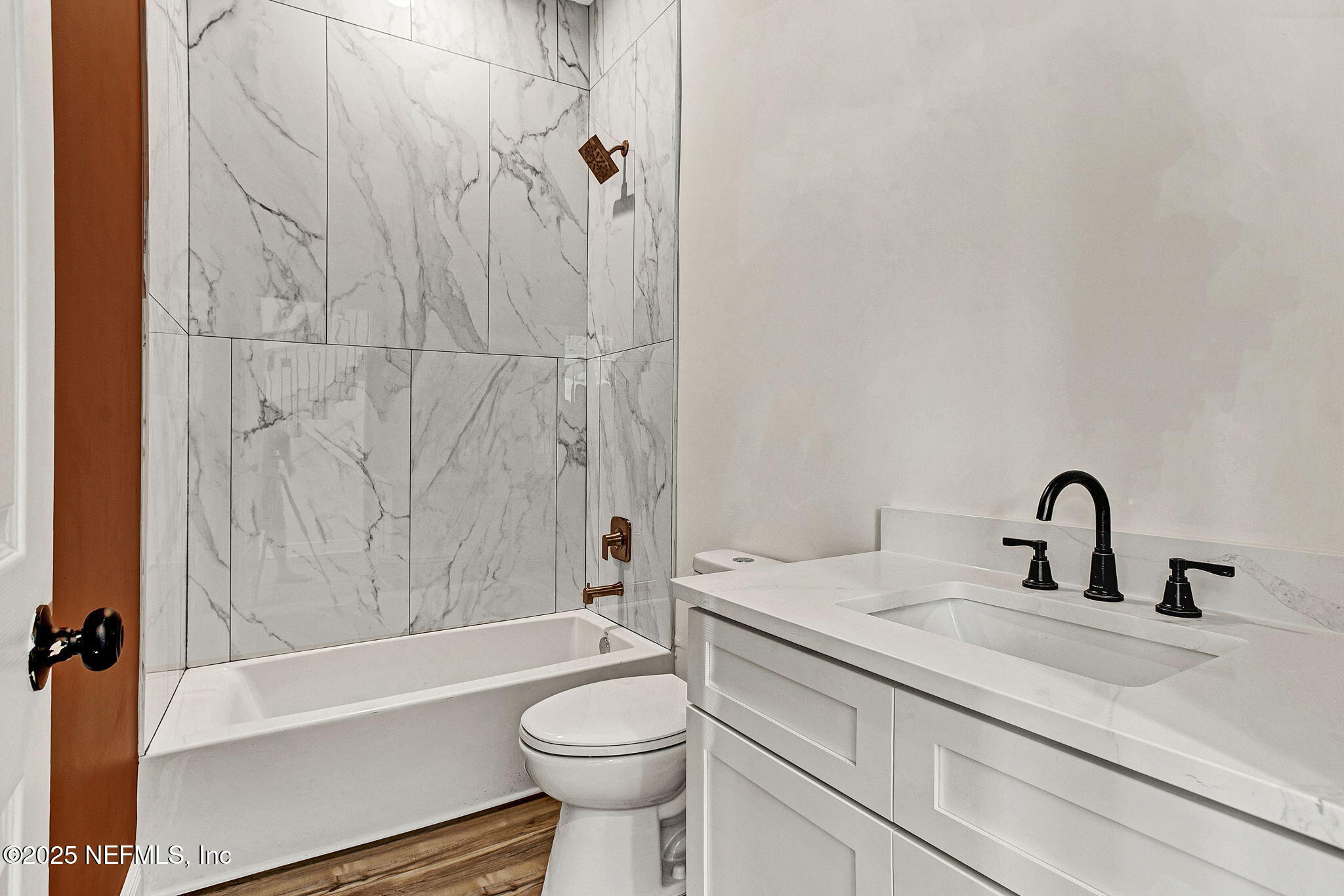 2841 Post Street Jacksonville, FL 32205 - Photo 20 of 40 a bathroom with a sink toilet and shower