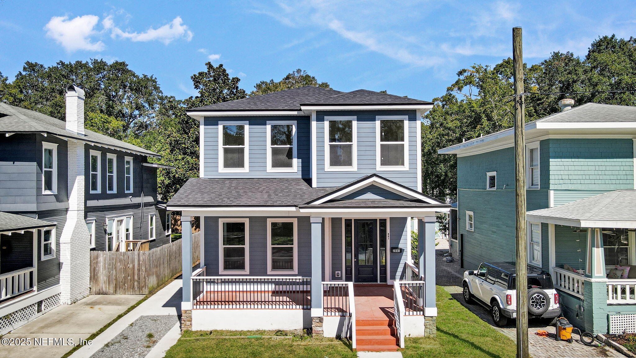 2841 Post Street Jacksonville, FL 32205 - Photo 2 of 40 a front view of a house with yard porch and furniture