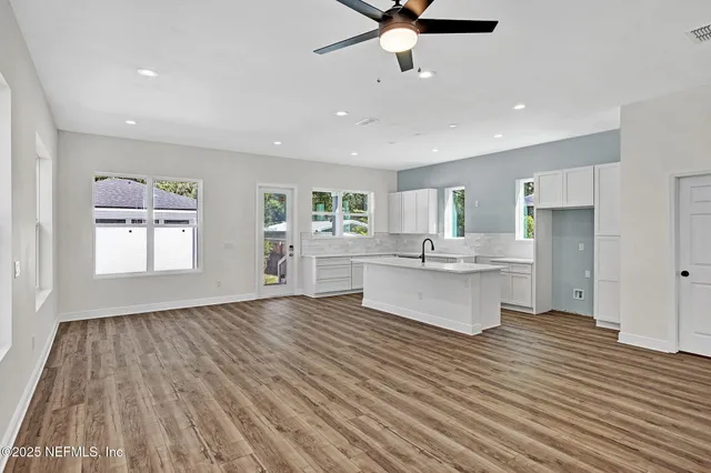 a kitchen with a sink and a window