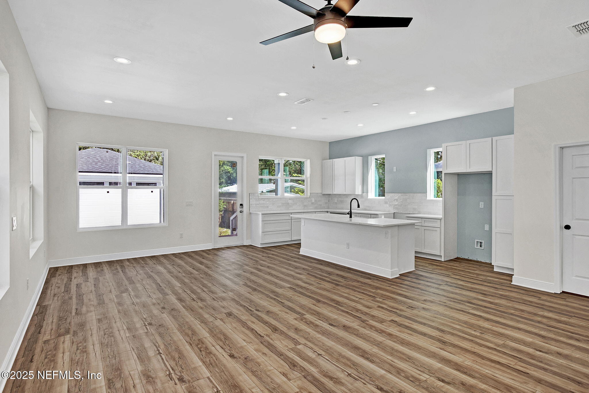 2841 Post Street Jacksonville, FL 32205 - Photo 38 of 40 a large white kitchen with a white countertops and cabinets