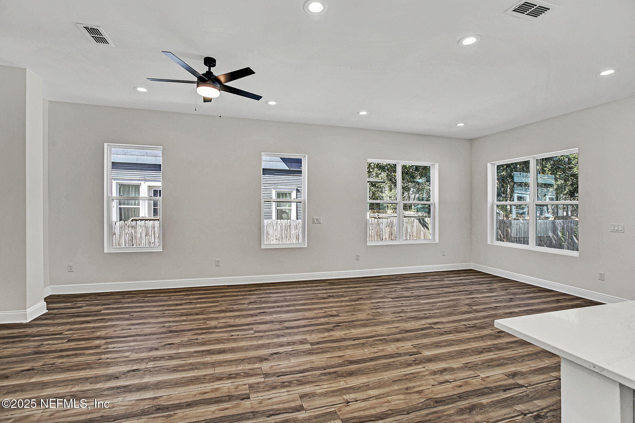 2841 Post Street Jacksonville, FL 32205 - Photo 40 of 40 a view of an empty room with wooden floor and a window