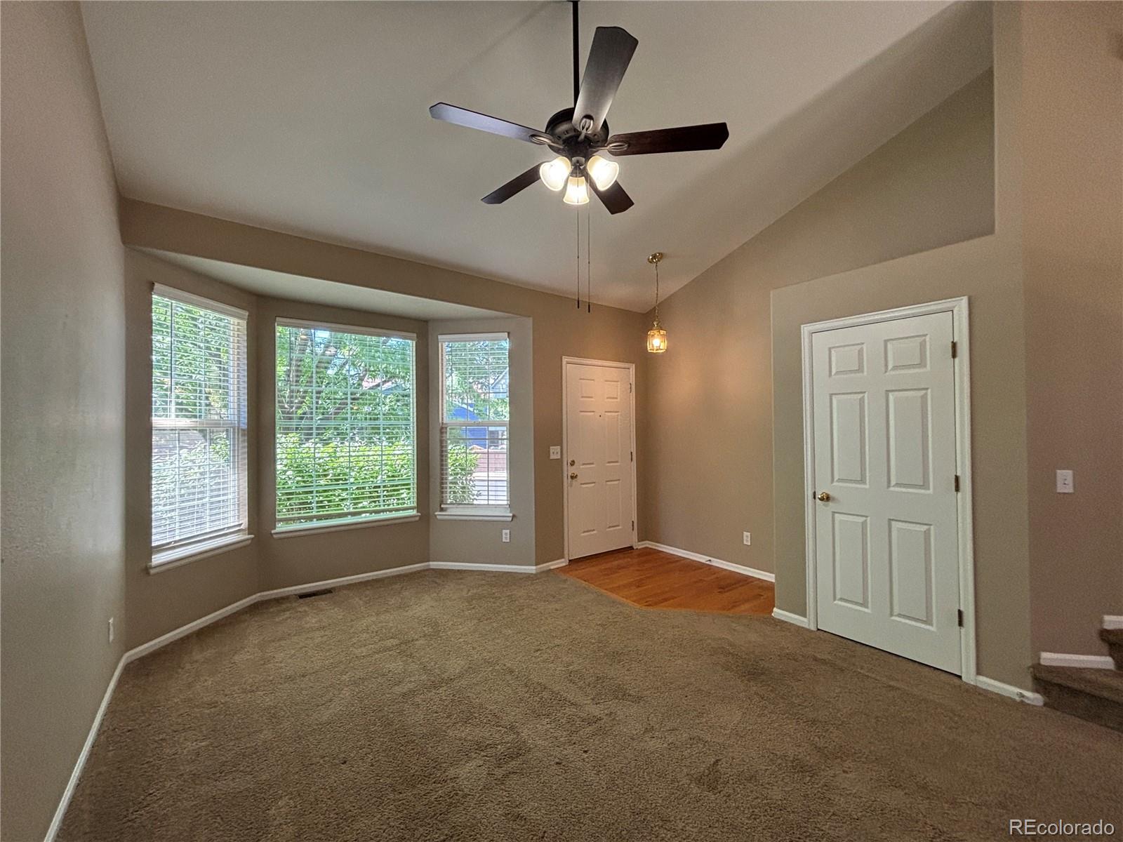 1281 Riddlewood Road Highlands Ranch, CO 80129 - Photo 3 of 27 a view of an empty room with a window
