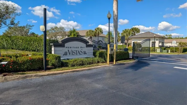 a view of a street with a building in the background