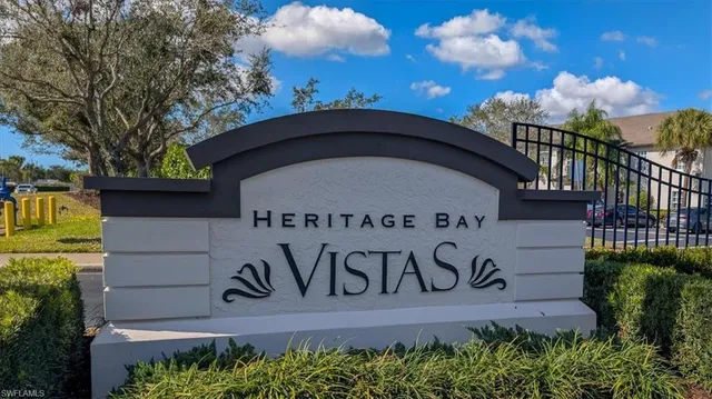 a view of a city with an ocean