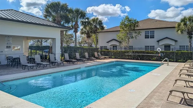 a view of a swimming pool and outdoor space