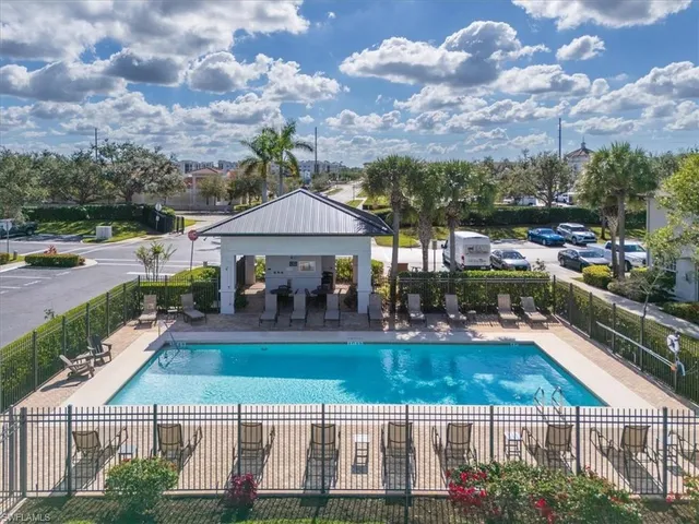 a view of a chairs and table in patio