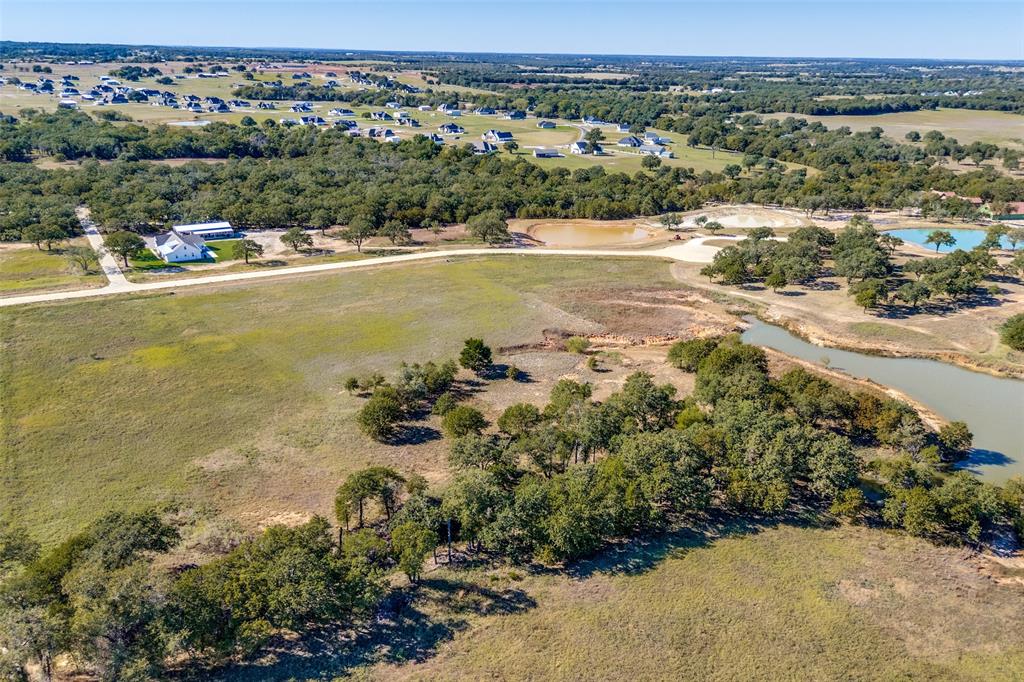 1074 Cornerstone Road Poolville, TX 76487 - Photo 5 of 10 a view of a city with ocean view
