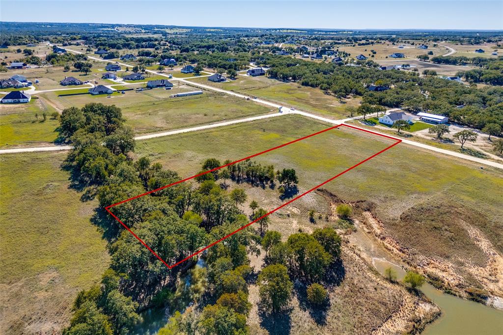 1074 Cornerstone Road Poolville, TX 76487 - Photo 6 of 10 a view of a tennis court