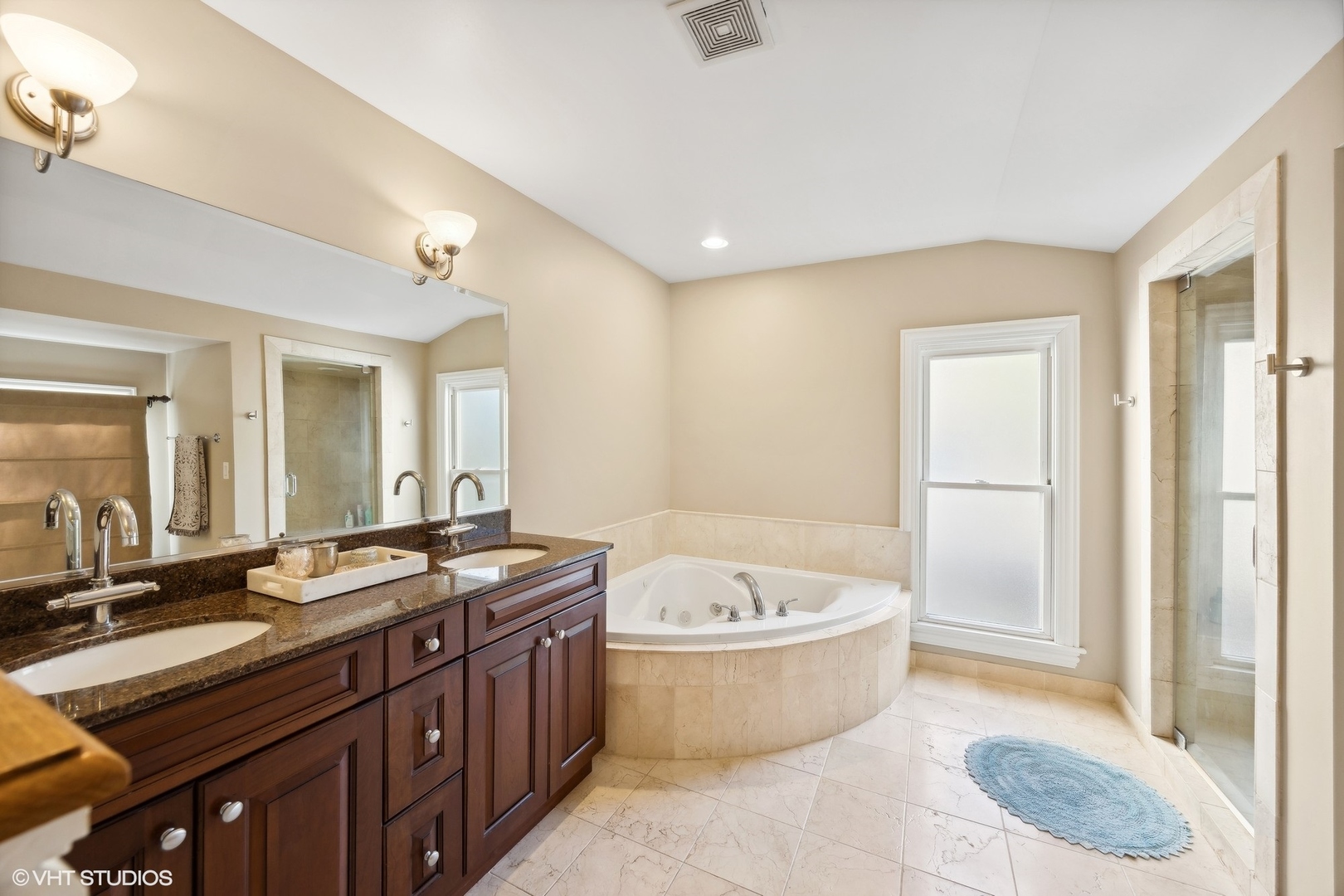 129 Barrypoint Road Riverside, IL 60546 - Photo 27 of 39 a spacious bathroom with a granite countertop sink a large mirror and bathtub