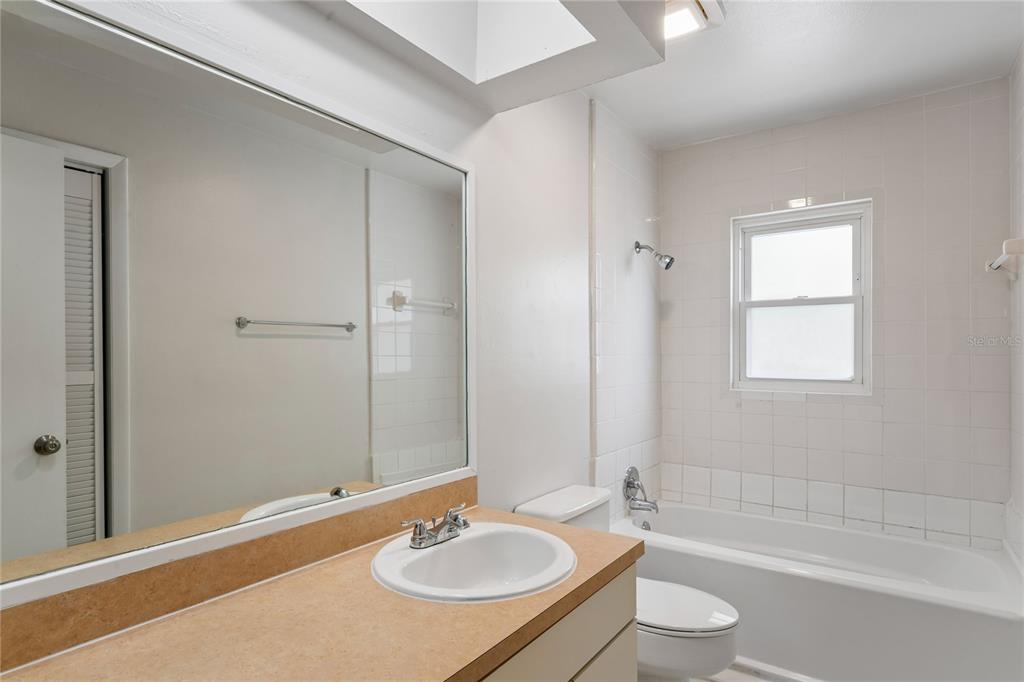 1907 Rambling Lane Brandon, FL 33510 - Photo 21 of 24 a bathroom with a sink toilet and shower