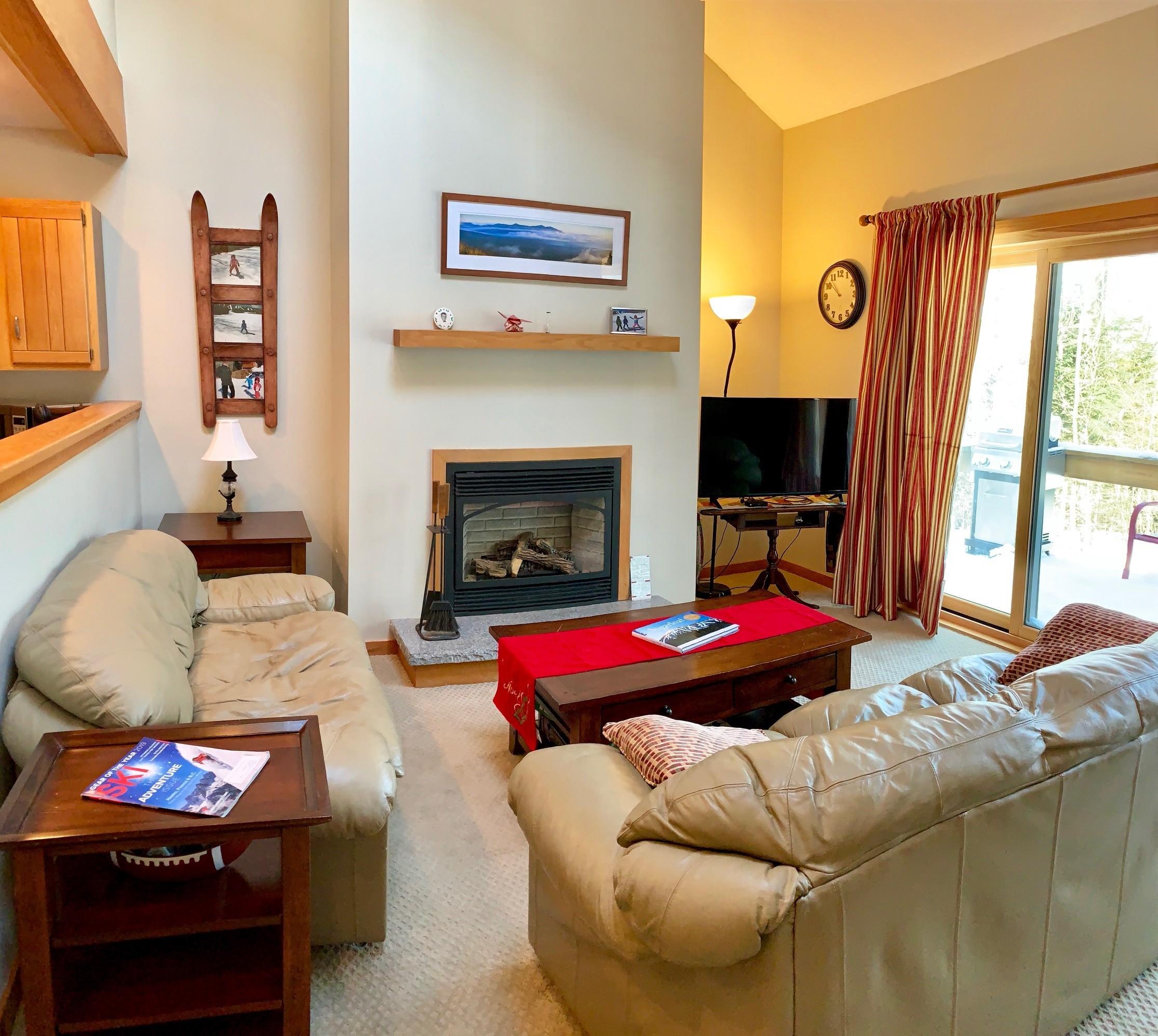 2152 Burnt Mountain Road, Unit 2152 Carrabassett Valley, ME 04947 - Photo 3 of 19 Living Room - Firelplace - Deck