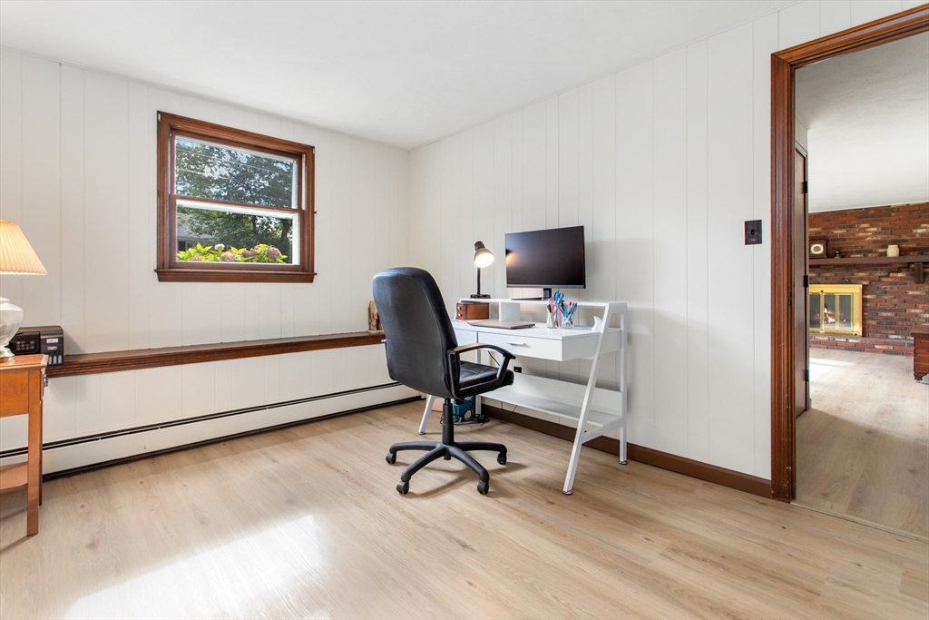 9 Hemlock Road Reading, MA 01867 - Photo 27 of 42 a view of a workspace with furniture and a window