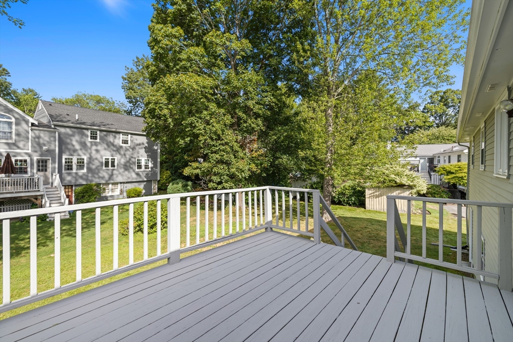 9 Hemlock Road Reading, MA 01867 - Photo 32 of 42 a view of balcony with wooden floor and fence