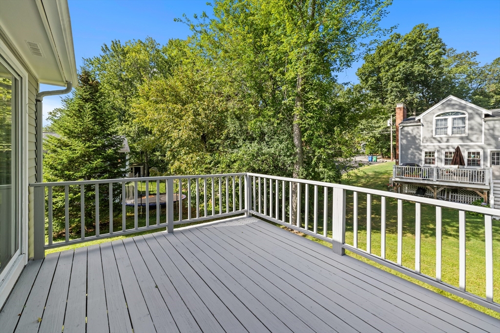9 Hemlock Road Reading, MA 01867 - Photo 33 of 42 a view of a wooden roof deck
