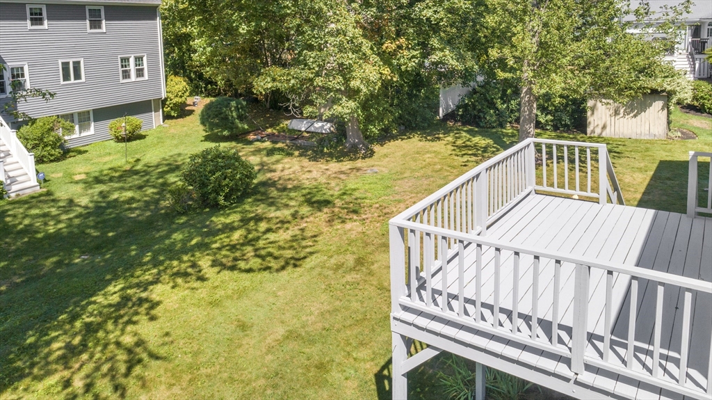 9 Hemlock Road Reading, MA 01867 - Photo 37 of 42 a view of balcony with wooden floor and fence