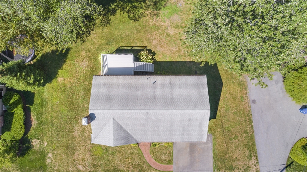 9 Hemlock Road Reading, MA 01867 - Photo 39 of 42 an aerial view of residential house with outdoor space and swimming pool