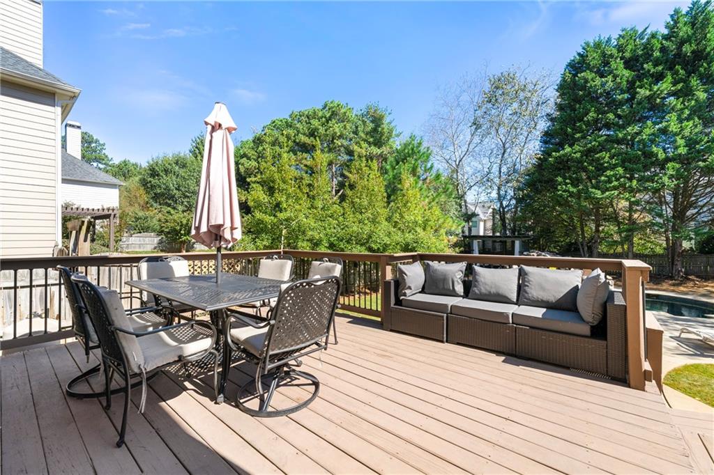 12579 Huntington Trace Alpharetta, GA 30005 - Photo 49 of 64 a view of a patio on the roof deck