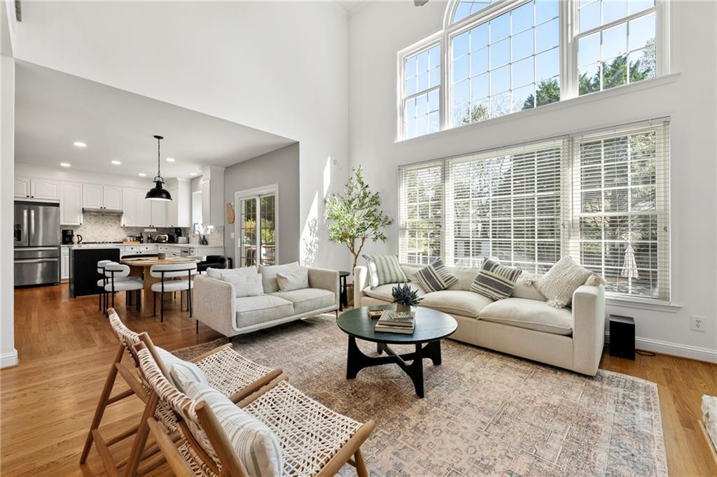 12579 Huntington Trace Alpharetta, GA 30005 - Photo 5 of 64 a living room with furniture and a large window