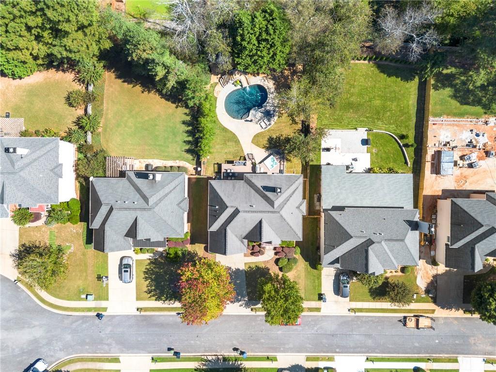 12579 Huntington Trace Alpharetta, GA 30005 - Photo 59 of 64 an aerial view of residential houses with outdoor space
