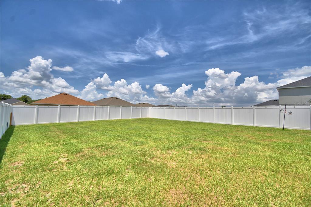 4340 Reding Way Lakeland, FL 33813 - Photo 57 of 63 a view of a big yard with a house