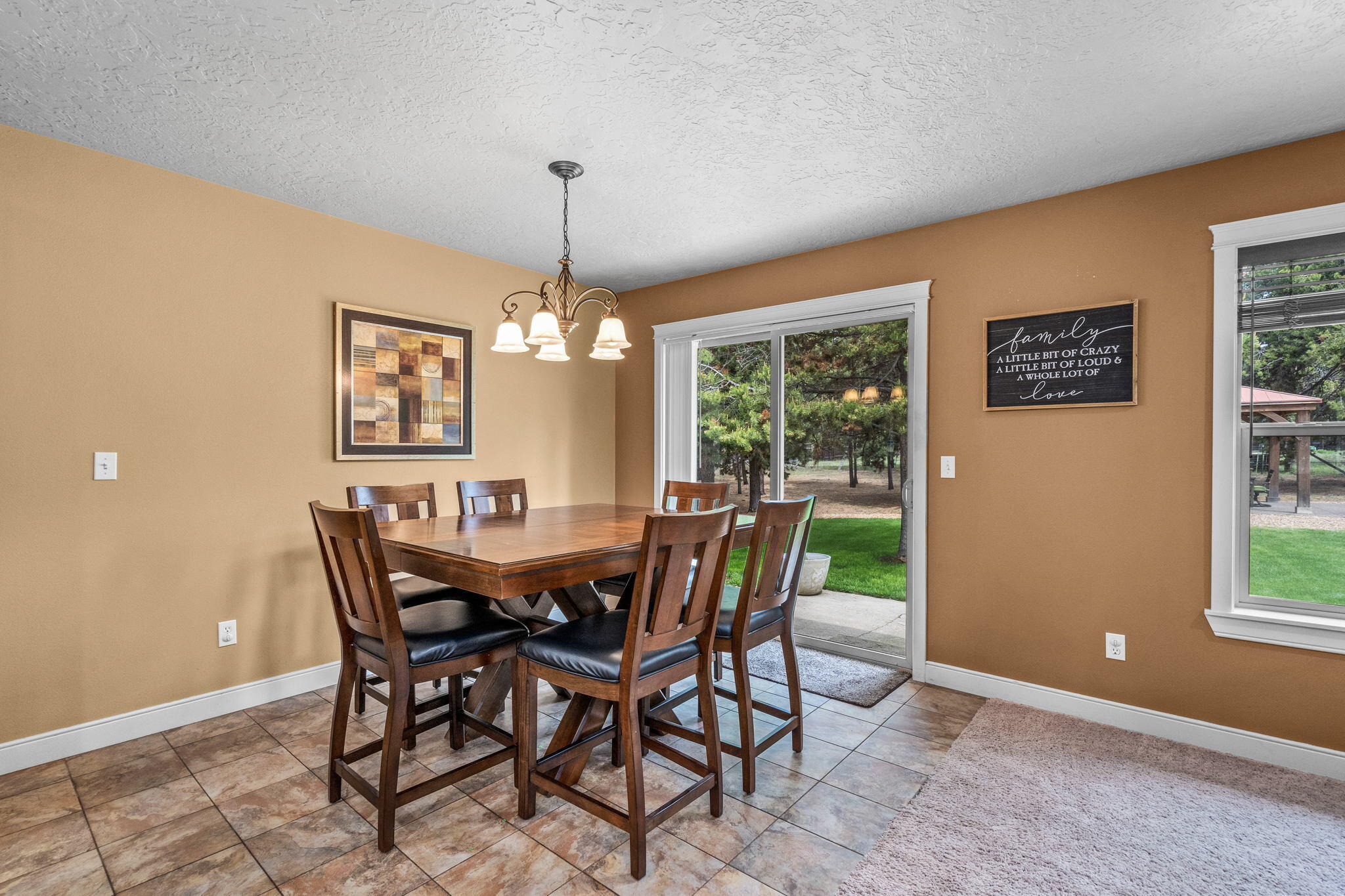 16048 Aqua Road La Pine, OR 97739 - Photo 9 of 38 Dining Area has tile floors & access to patio