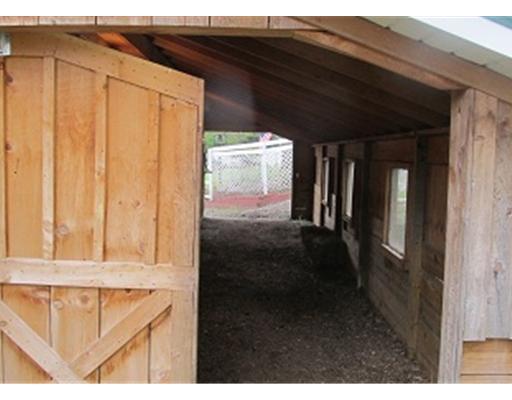 1250 Pinewood Road Irwin, PA 15642 - Photo 13 of 18 Stable/Barn. Sliding door leads to 4 horse stalls