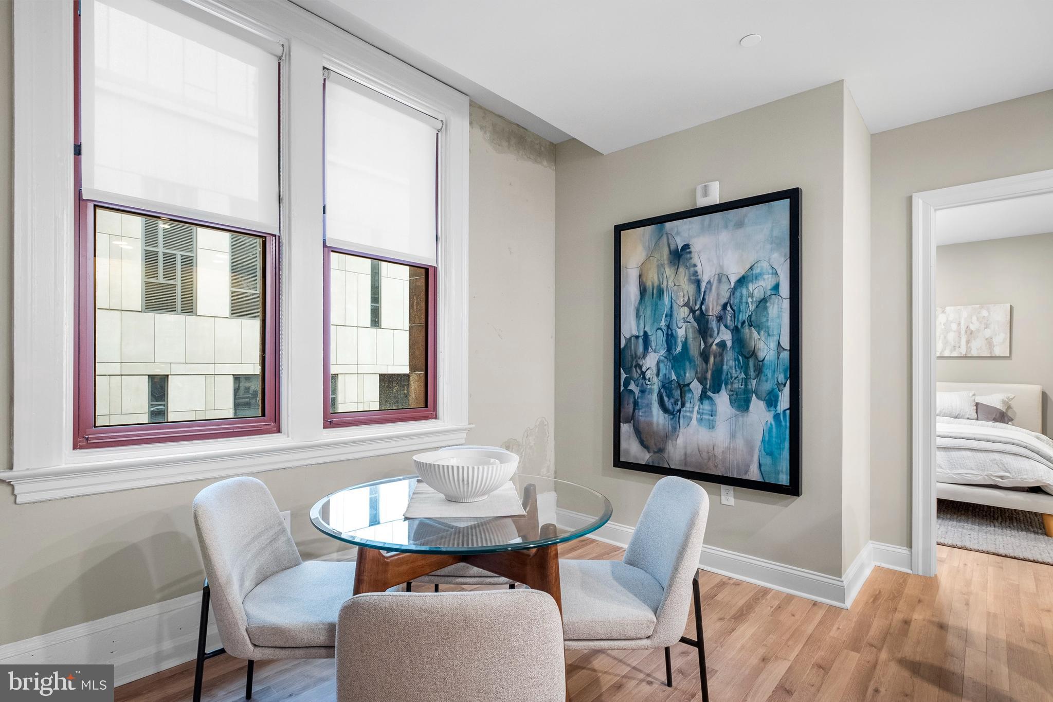 1420-22 Chestnut Street, Unit 301 Philadelphia, PA 19102 - Photo 4 of 29 a dining room with furniture and window