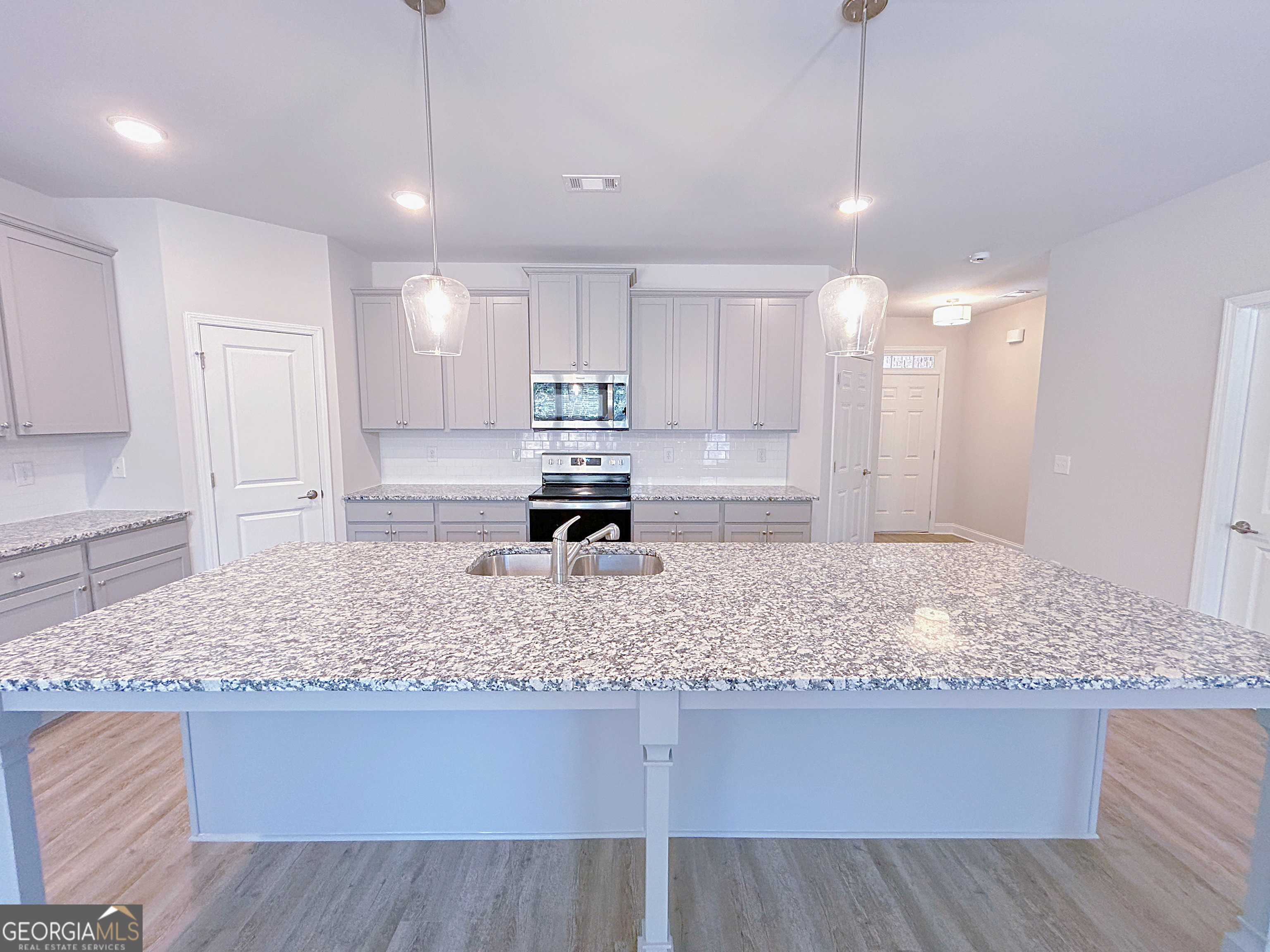 2594 Mills Commons Drive Decatur, GA 30034 - Photo 2 of 10 a view of kitchen and kitchen island