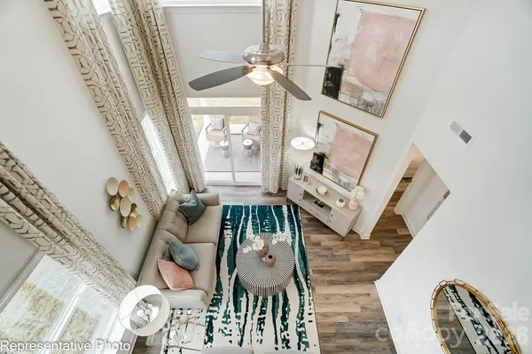 a view of an entryway with wooden floor