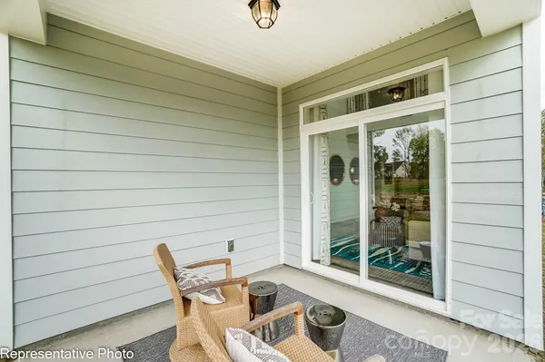 a front view of a house with a porch