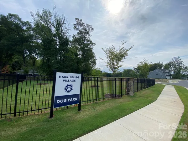 a view of a park with welcome board
