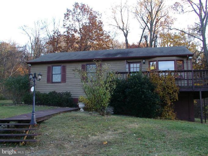 157 Remount View Road Front Royal, VA 22630 - Photo 1 of 13 a view of a house with a yard