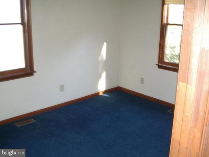 157 Remount View Road Front Royal, VA 22630 - Photo 2 of 13 an empty room with a window