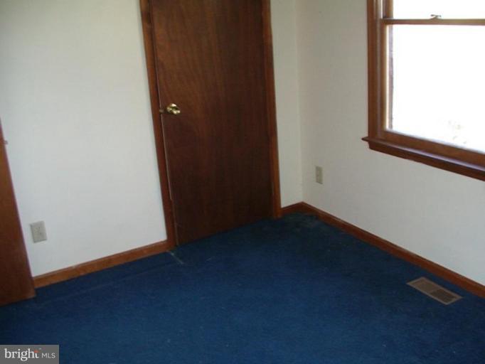 157 Remount View Road Front Royal, VA 22630 - Photo 3 of 13 an empty room with a window