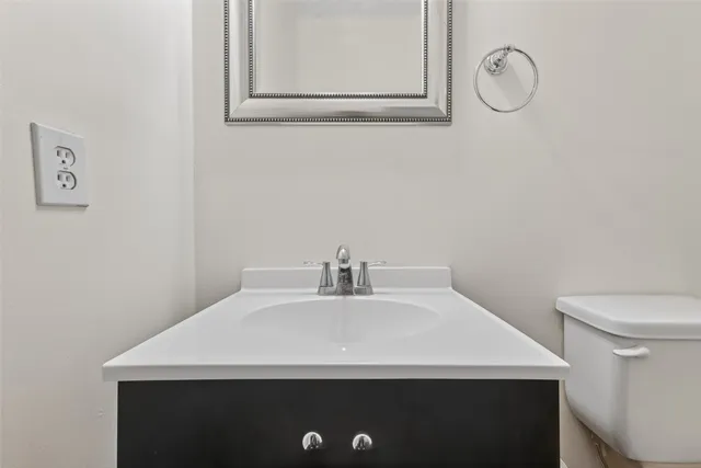 a bathroom with a sink and a toilet