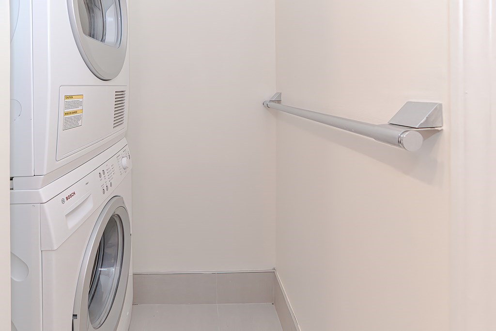 59 Brainerd Road, Unit 406 Boston, MA 02134 - Photo 13 of 19 a utility room with dryer and washer