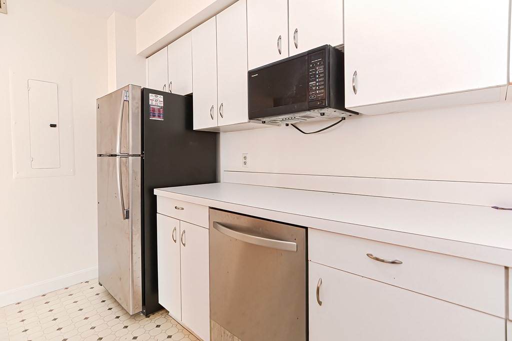 59 Brainerd Road, Unit 406 Boston, MA 02134 - Photo 15 of 19 a utility room with dryer and washer